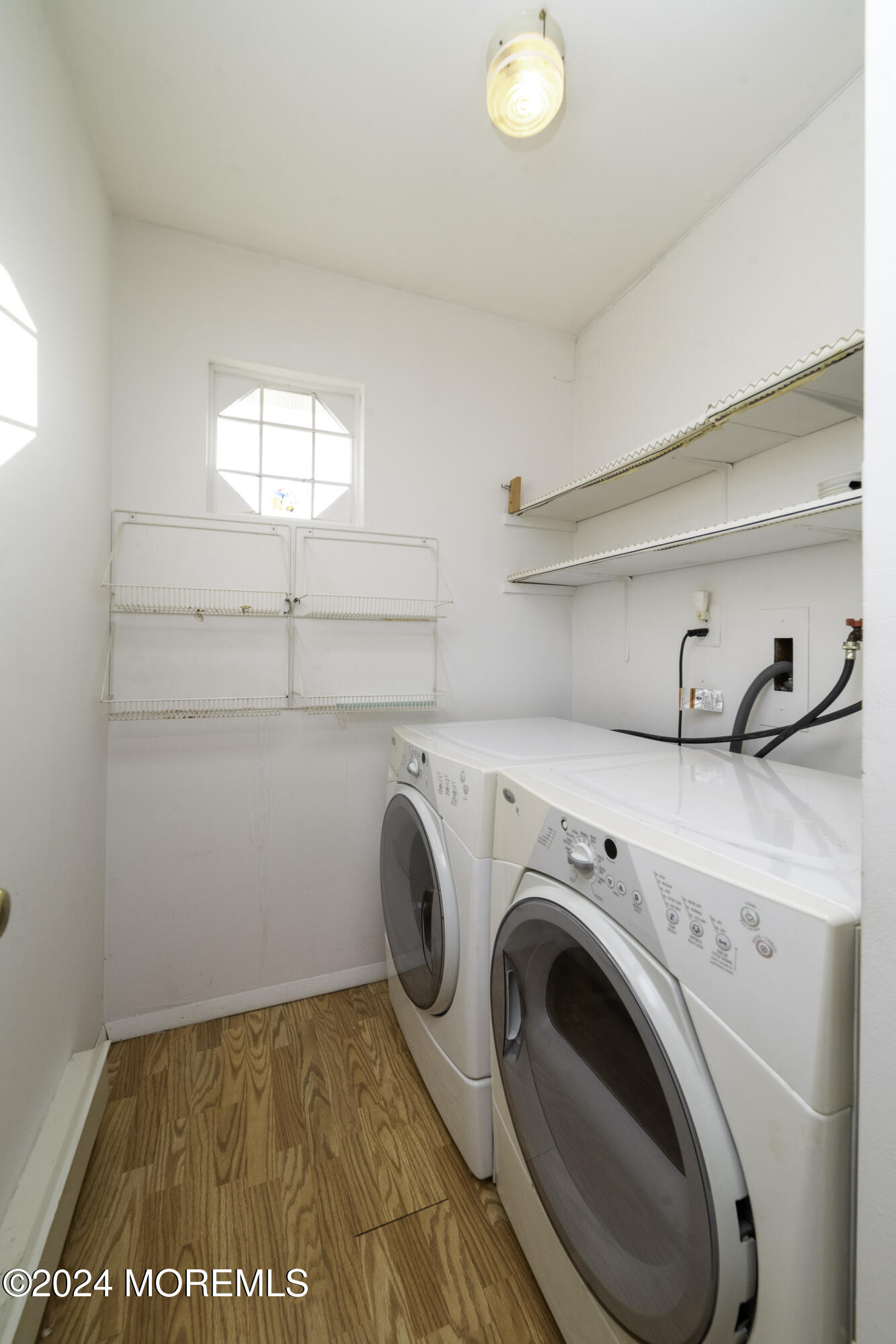 16 Lamb Road Brick, NJ 08724 - Photo 7 of 23 a utility room with dryer and washer