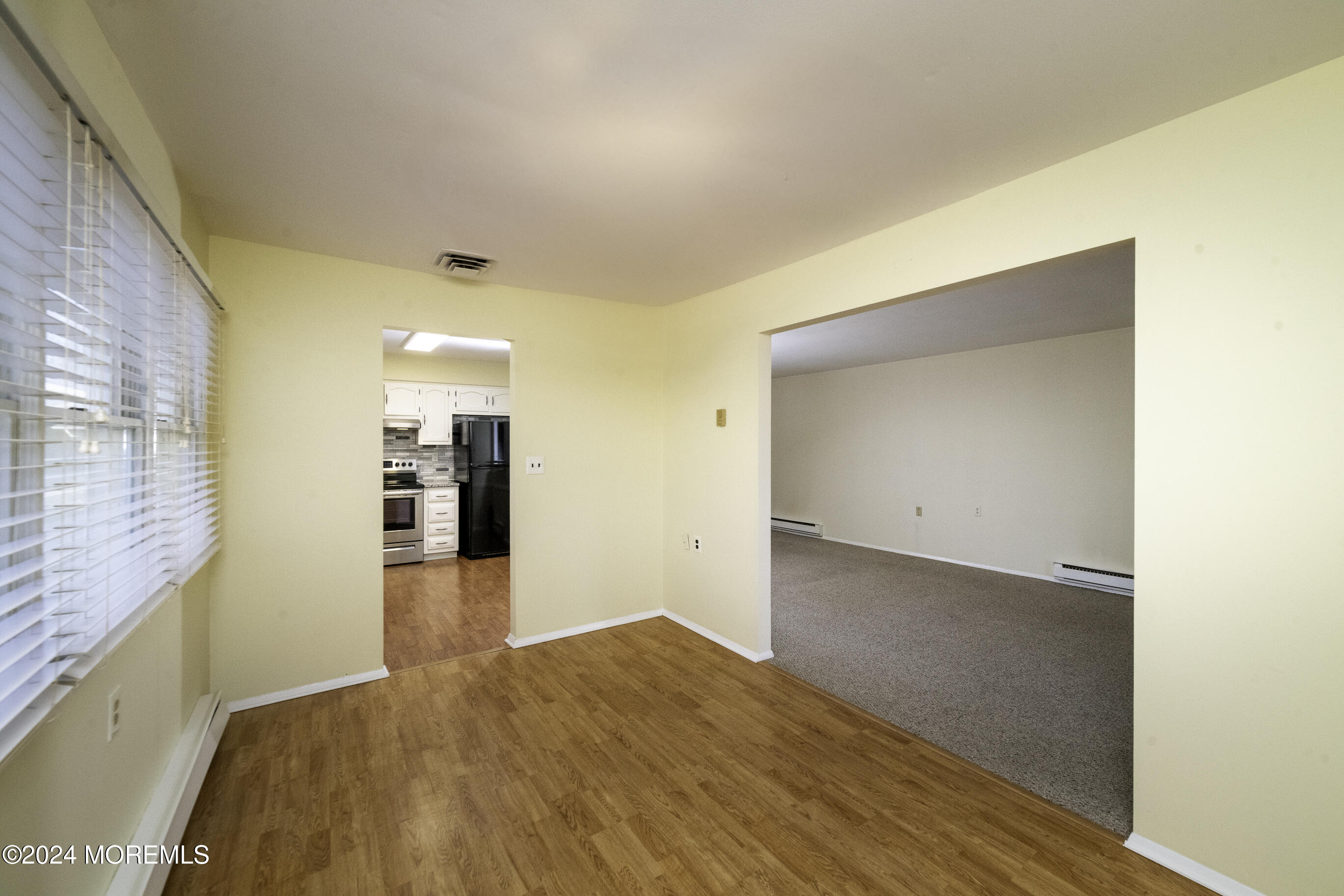 16 Lamb Road Brick, NJ 08724 - Photo 9 of 23 a view of empty room with wooden floor