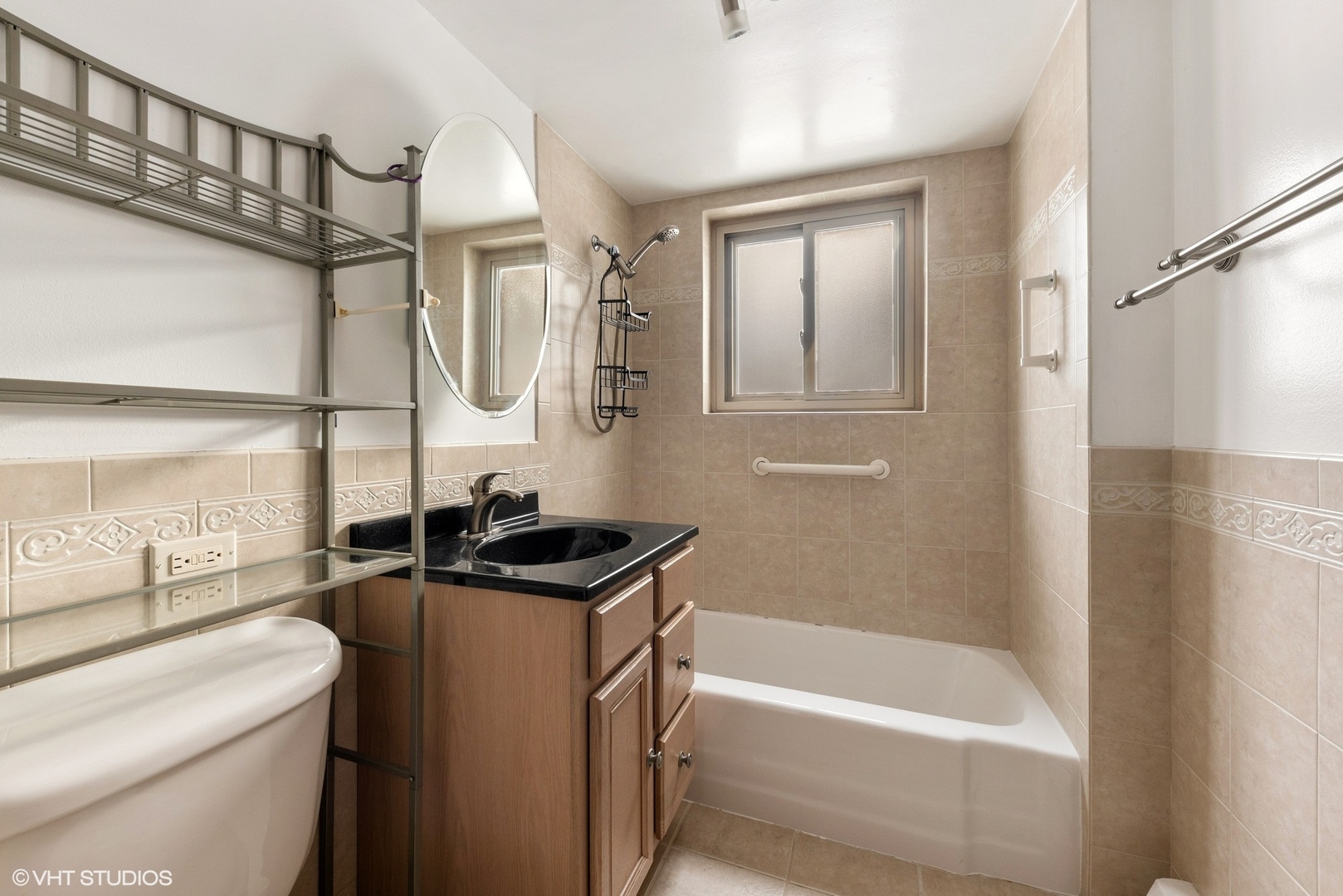 701 Busse Highway, Unit 1A Park Ridge, IL 60068 - Photo 14 of 15 a bathroom with a sink a toilet and bathtub