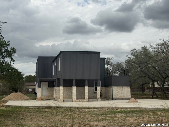 174 Red Fox Poteet, TX 78065 - Photo 1 of 9 a house with trees in the background