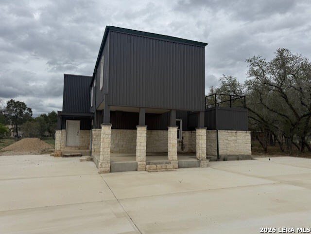 174 Red Fox Poteet, TX 78065 - Photo 2 of 9 a front view of a house with a garage
