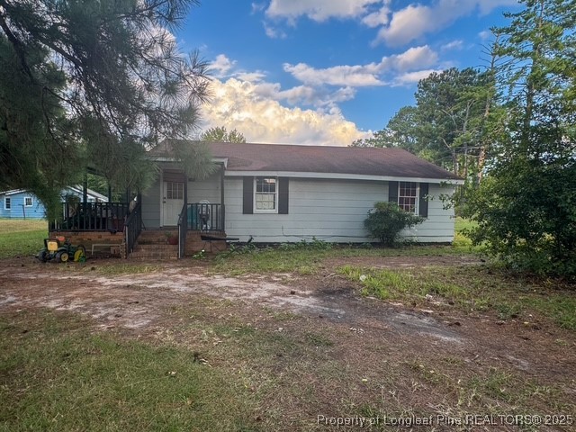 1600 Easterling Drive Spring Lake, NC 28390 - Photo 12 of 21 a view of a house with yard and a tree