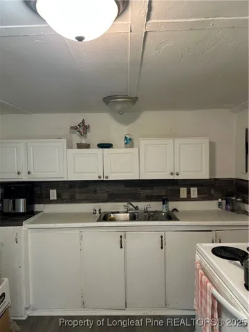 a bed room with a bed and furniture