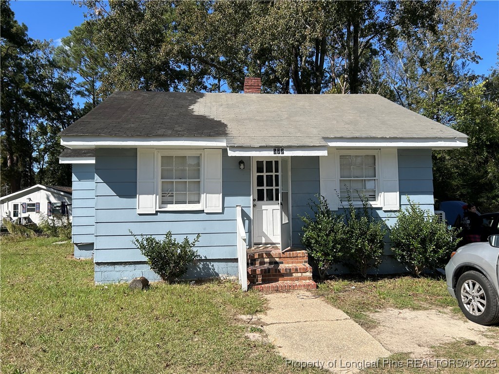 1600 Easterling Drive Spring Lake, NC 28390 - Photo 3 of 21 a front view of a house with garden