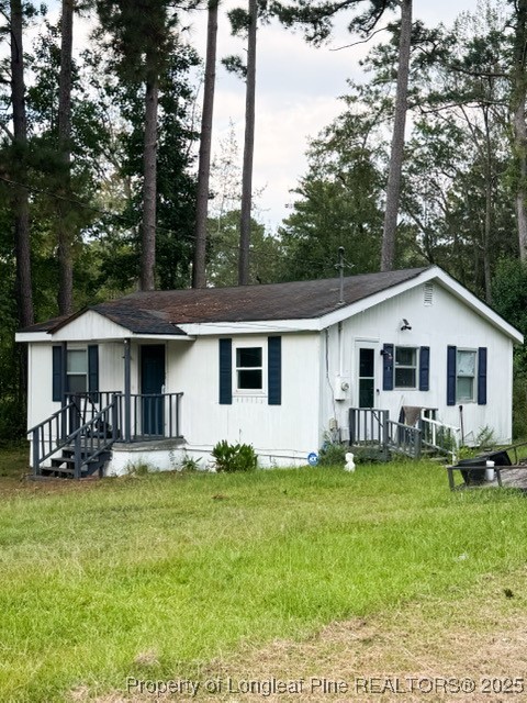 1600 Easterling Drive Spring Lake, NC 28390 - Photo 6 of 21 a front view of a house with garden