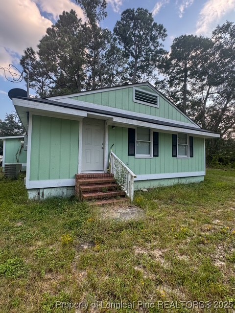 1600 Easterling Drive Spring Lake, NC 28390 - Photo 7 of 21 a backyard of a house with lots of green space