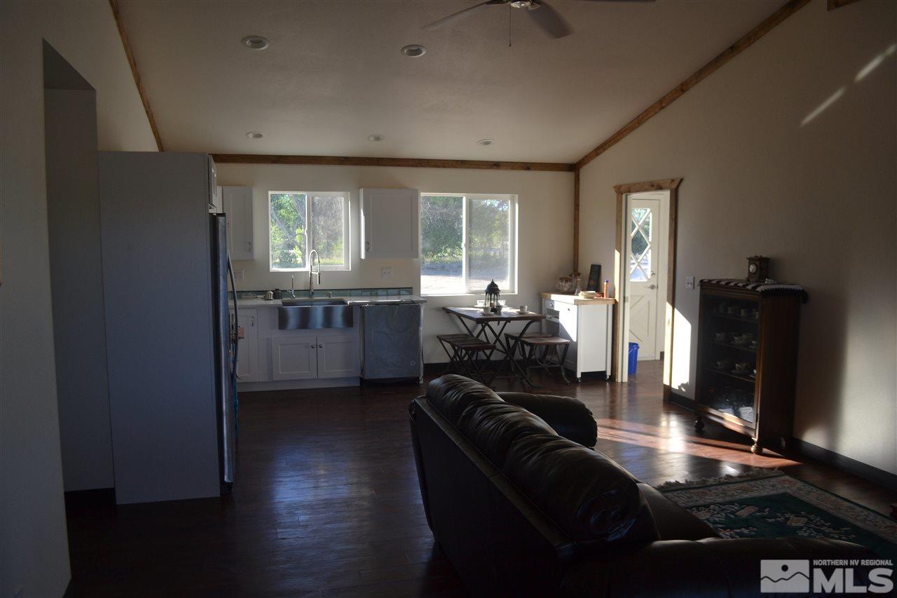 1100 McLean Road Fallon, NV 89406 - Photo 2 of 9 a living room with furniture window and wooden floor