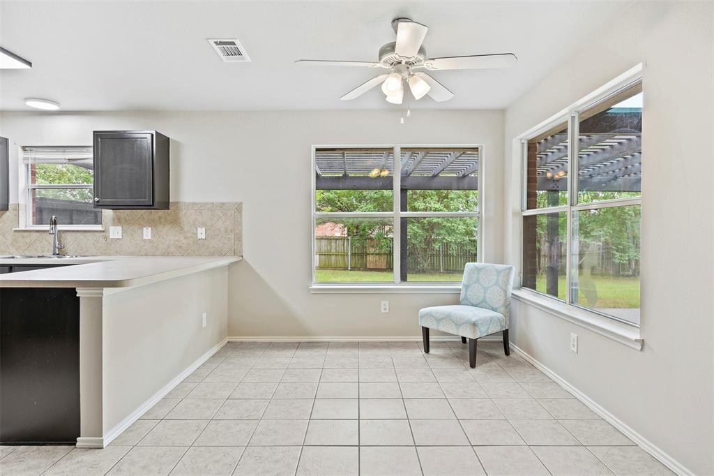 3931 Alpha Way Midlothian, TX 76065 - Photo 12 of 33 a living room with furniture and a large window