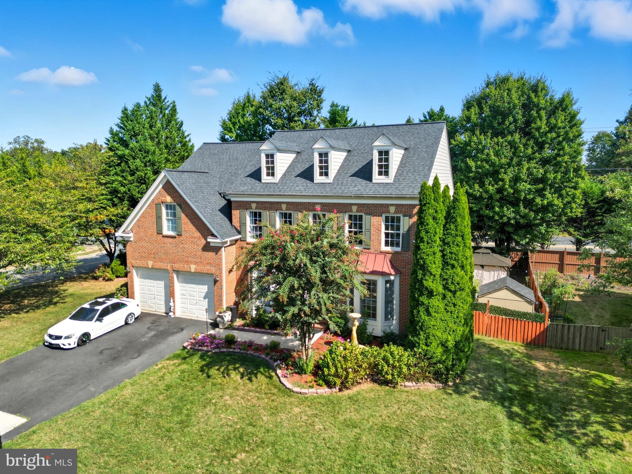 2725 Robaleed Way Herndon, VA 20171 - Photo 1 of 45 front view of a house with a yard