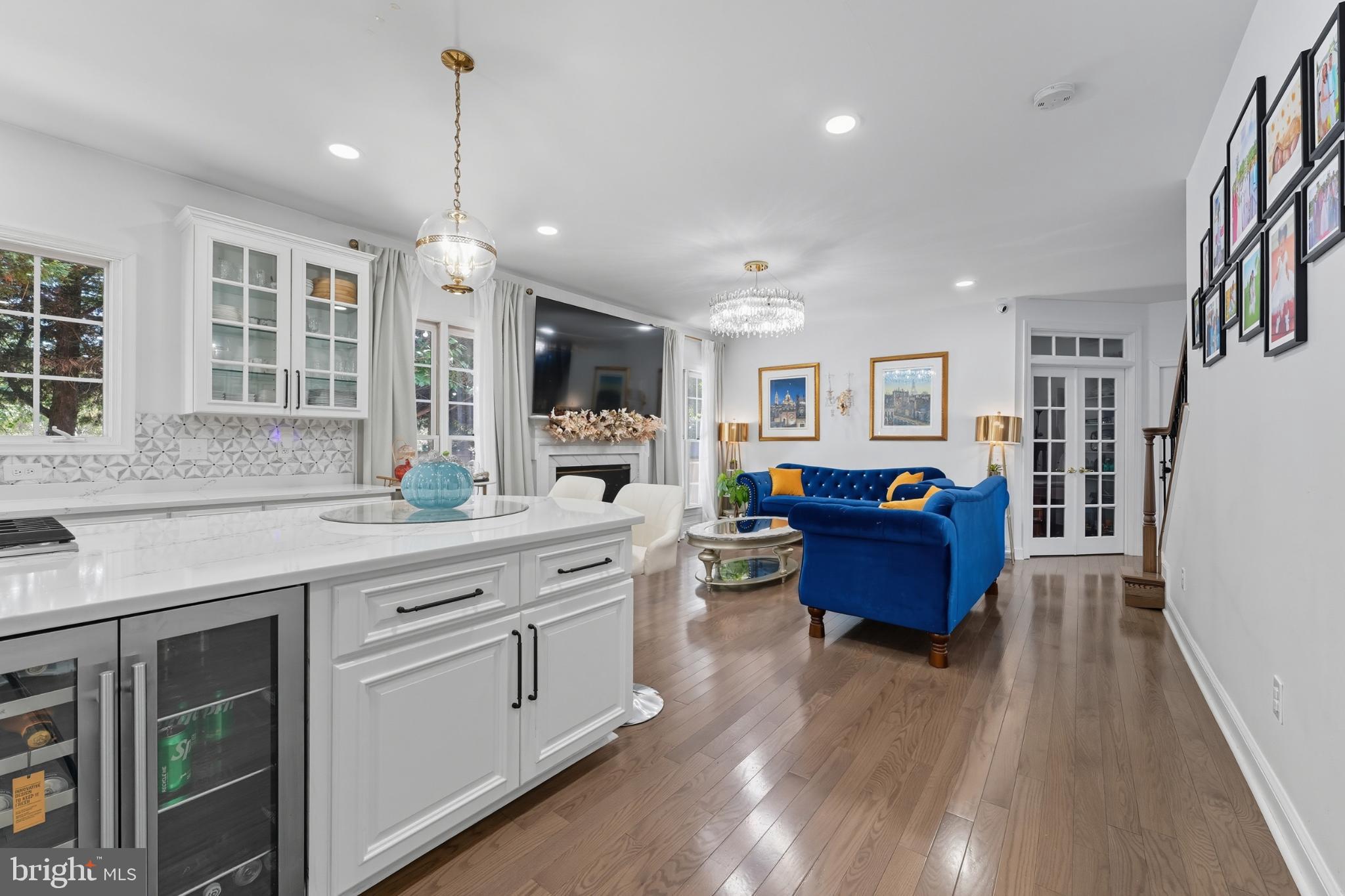 2725 Robaleed Way Herndon, VA 20171 - Photo 11 of 45 a large kitchen with stainless steel appliances granite countertop a lot of counter space and a wooden floor