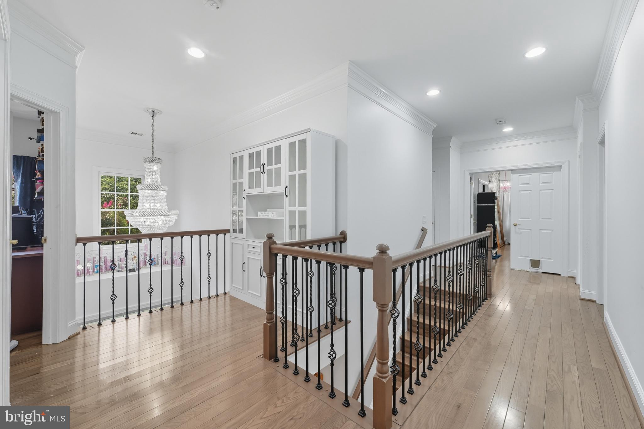 2725 Robaleed Way Herndon, VA 20171 - Photo 17 of 45 a view of hallway with wooden floor