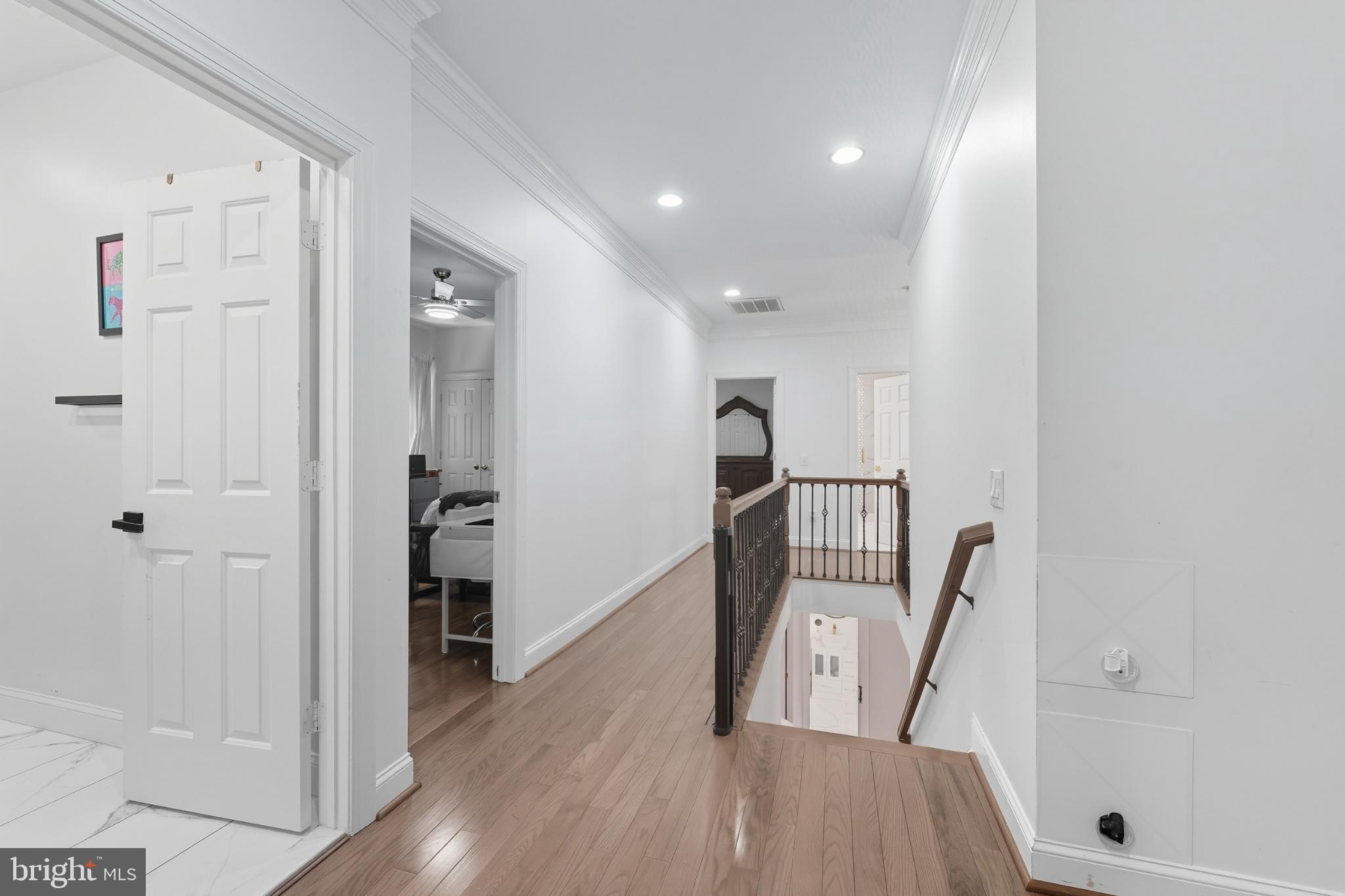2725 Robaleed Way Herndon, VA 20171 - Photo 22 of 45 a view of entryway with wooden floor