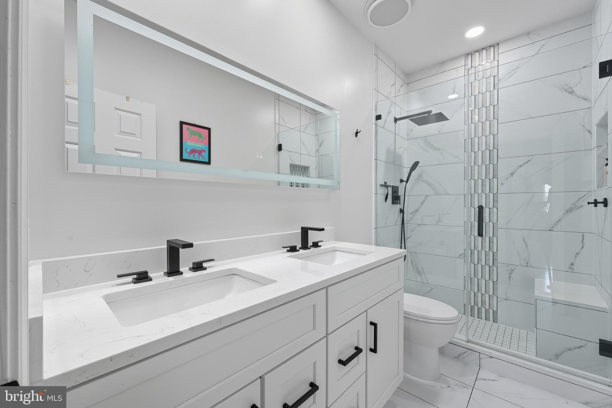 2725 Robaleed Way Herndon, VA 20171 - Photo 24 of 45 a bathroom with a sink toilet and shower