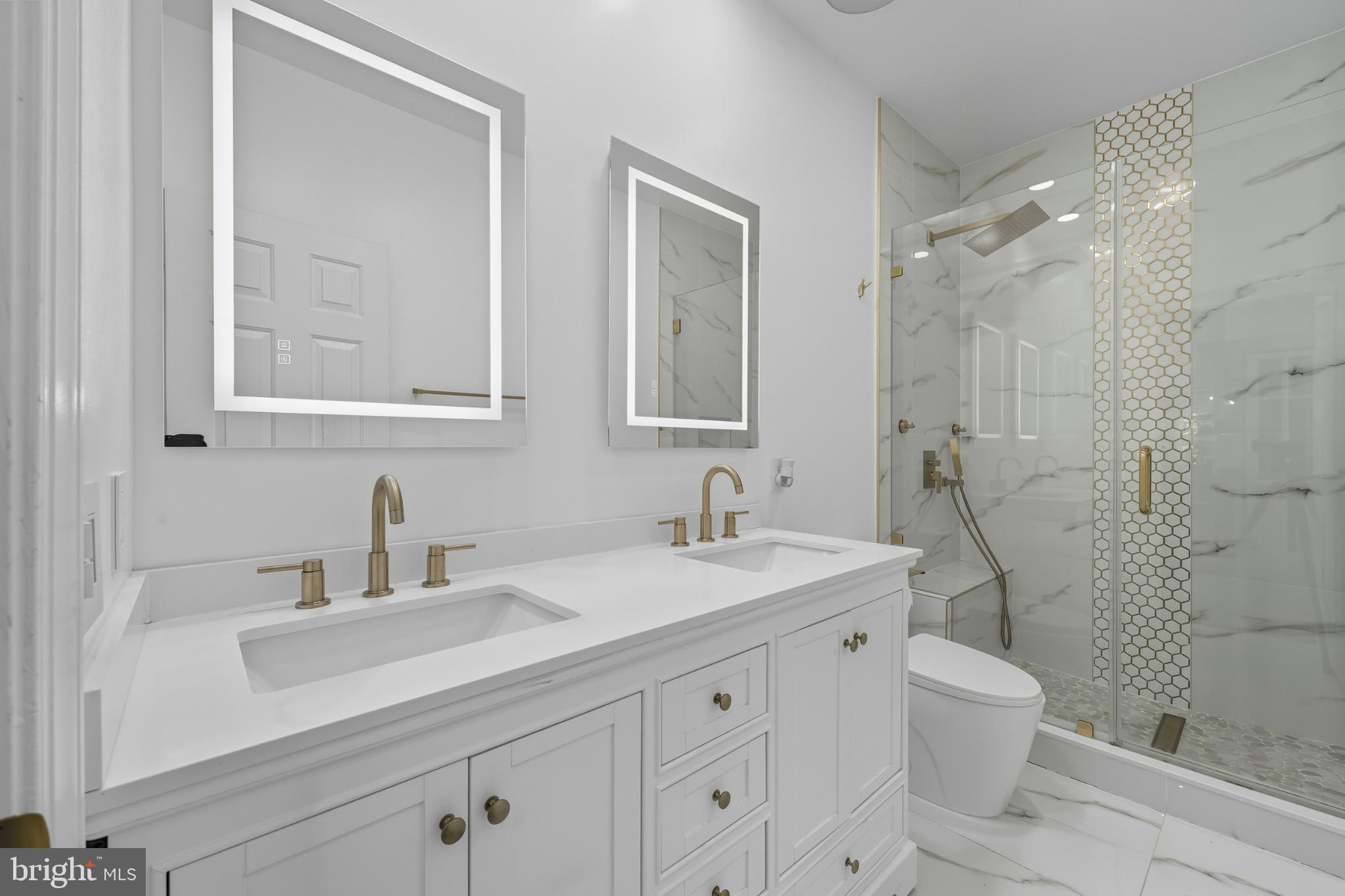 2725 Robaleed Way Herndon, VA 20171 - Photo 28 of 45 a bathroom with a sink a toilet and shower