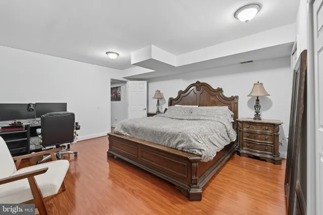 a bedroom with a bed and furniture