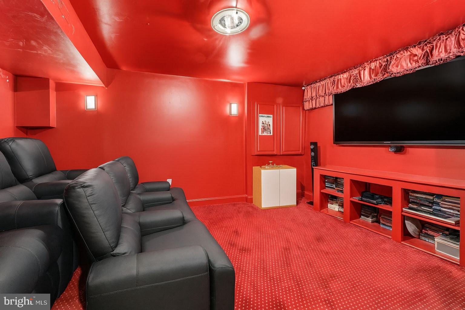 2725 Robaleed Way Herndon, VA 20171 - Photo 34 of 45 a living room with furniture and a flat screen tv