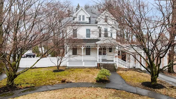a house with trees in front of it