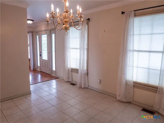 a view of a bathroom with a shower and a sink