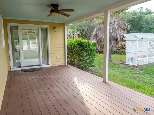 a view of backyard with a large window