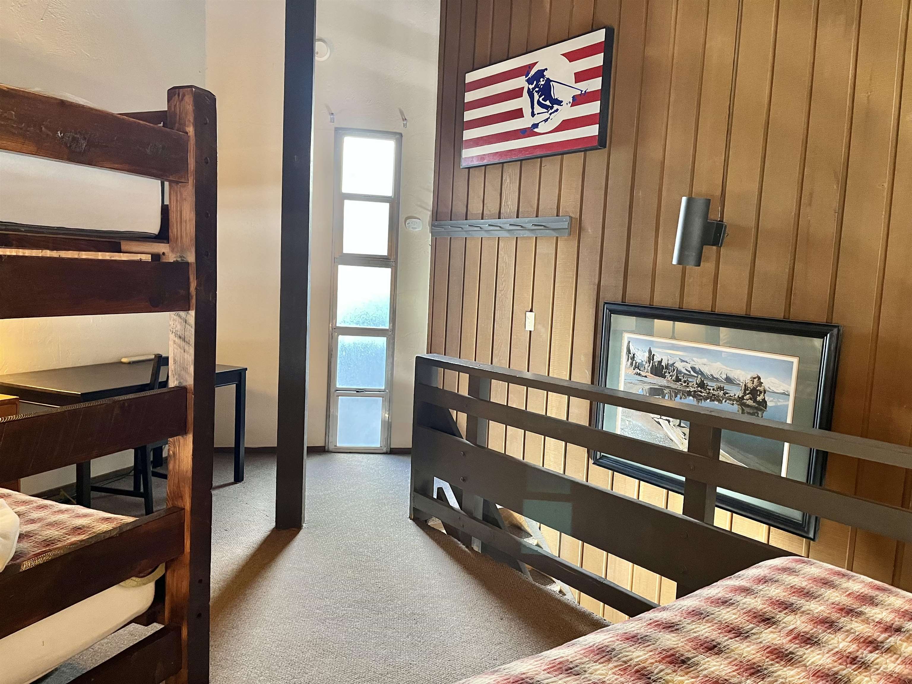 286 Old Mammoth Road, Unit 7 Mammoth Lakes, CA 93546 - Photo 16 of 31 a view of a hallway with furniture and window