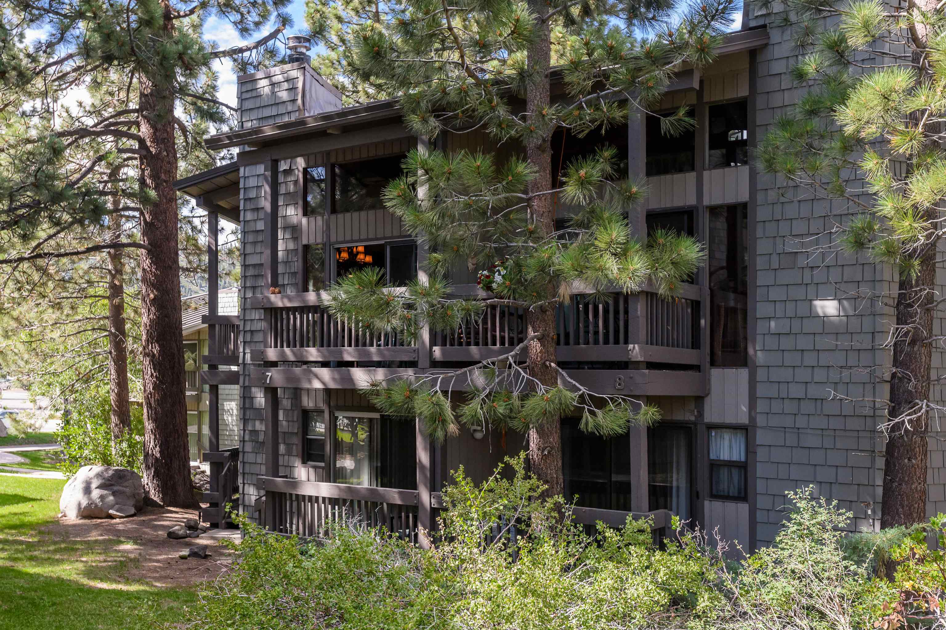 286 Old Mammoth Road, Unit 7 Mammoth Lakes, CA 93546 - Photo 2 of 31 a view of a house with yard and sitting area