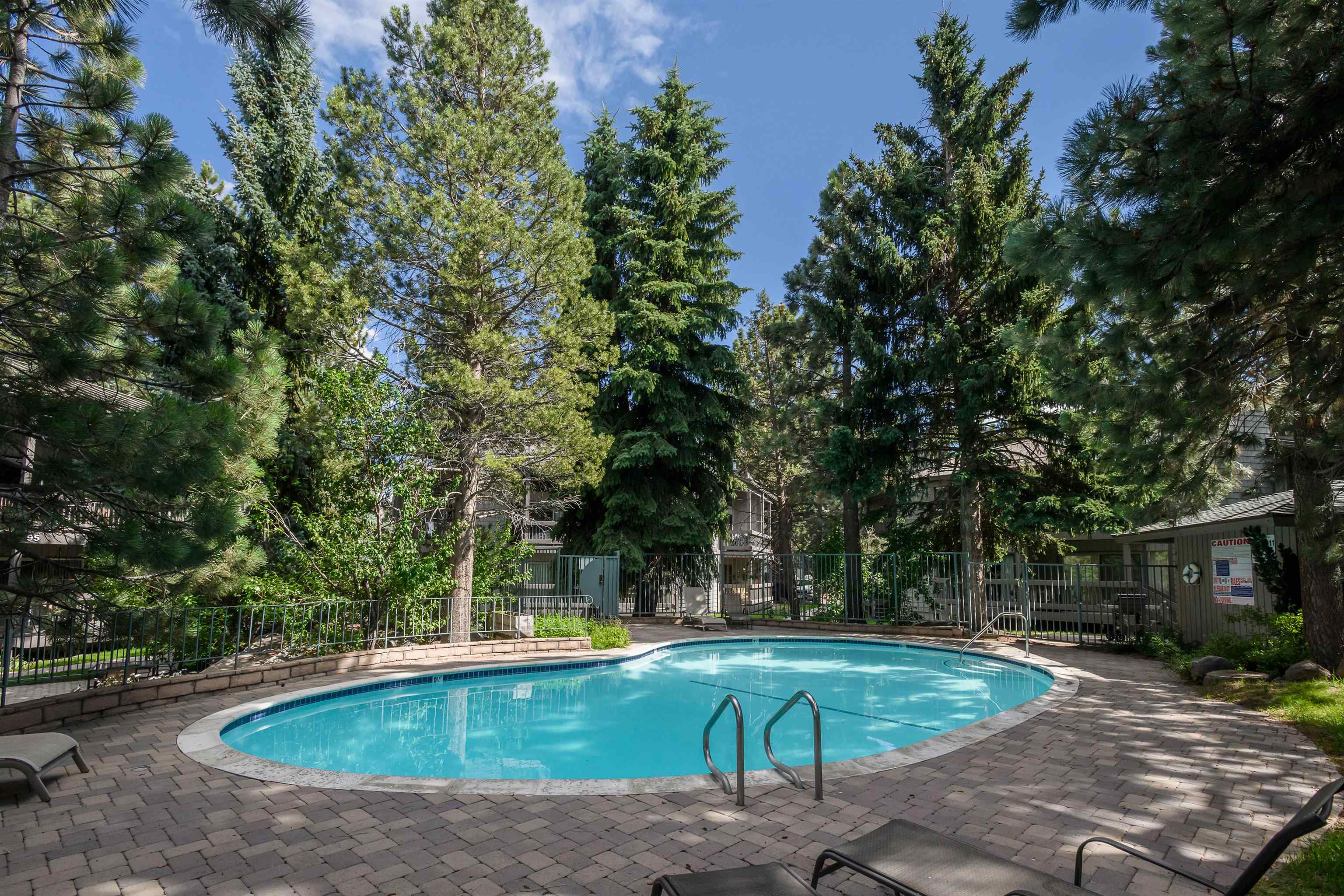 286 Old Mammoth Road, Unit 7 Mammoth Lakes, CA 93546 - Photo 27 of 31 a view of a swimming pool with a patio