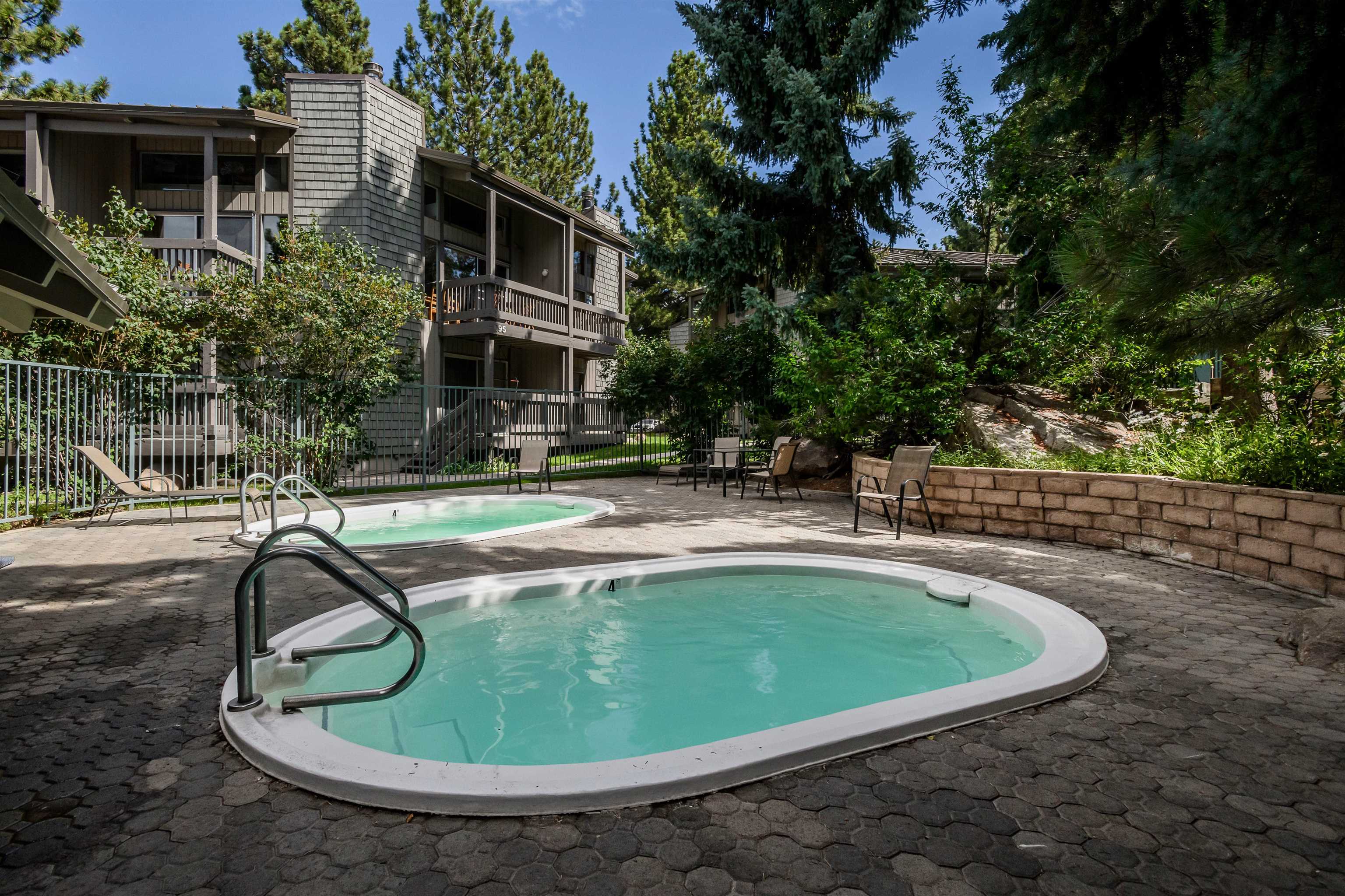 286 Old Mammoth Road, Unit 7 Mammoth Lakes, CA 93546 - Photo 29 of 31 a view of a swimming pool with a patio