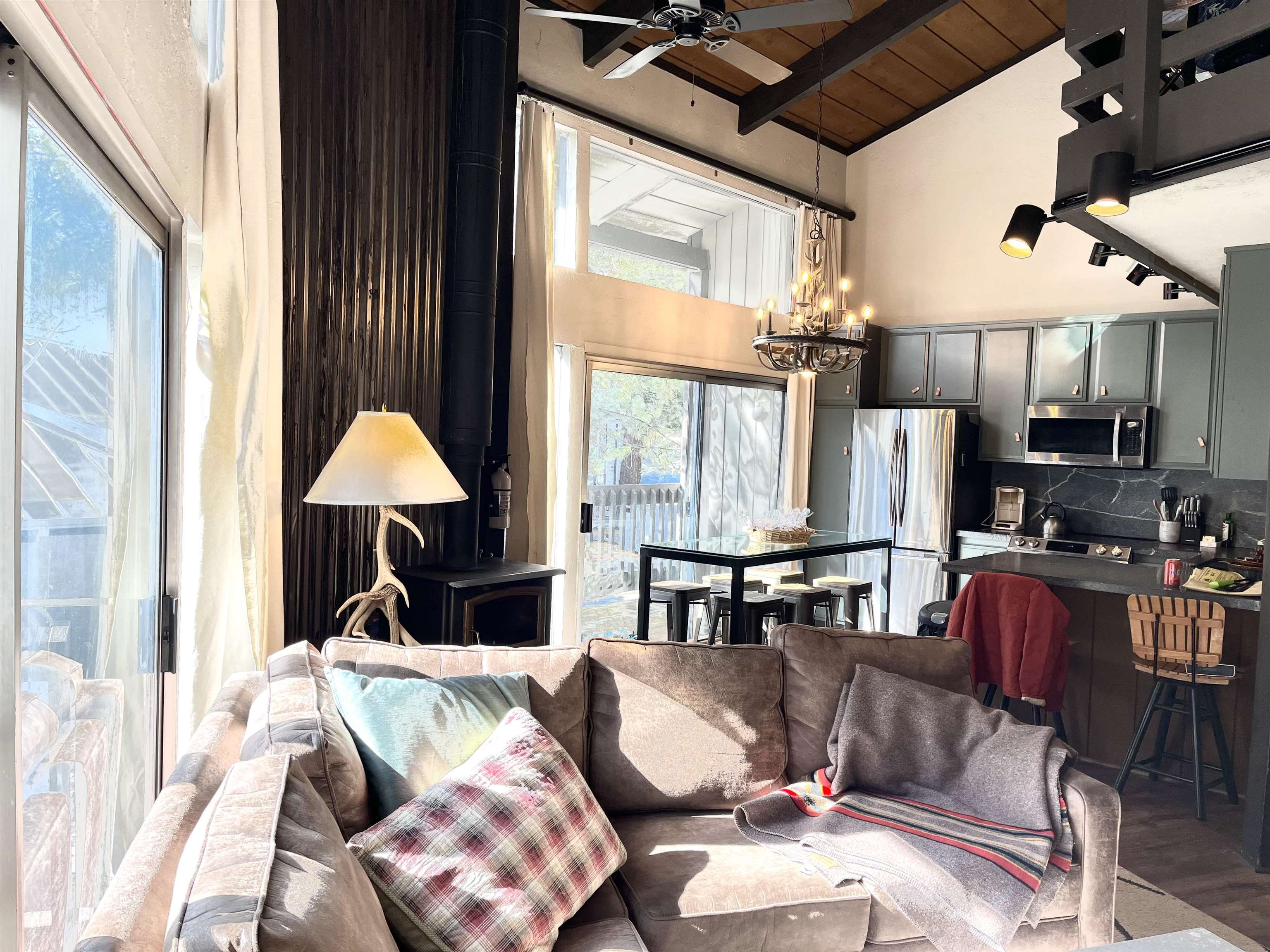 286 Old Mammoth Road, Unit 7 Mammoth Lakes, CA 93546 - Photo 5 of 31 a living room with furniture and a large window