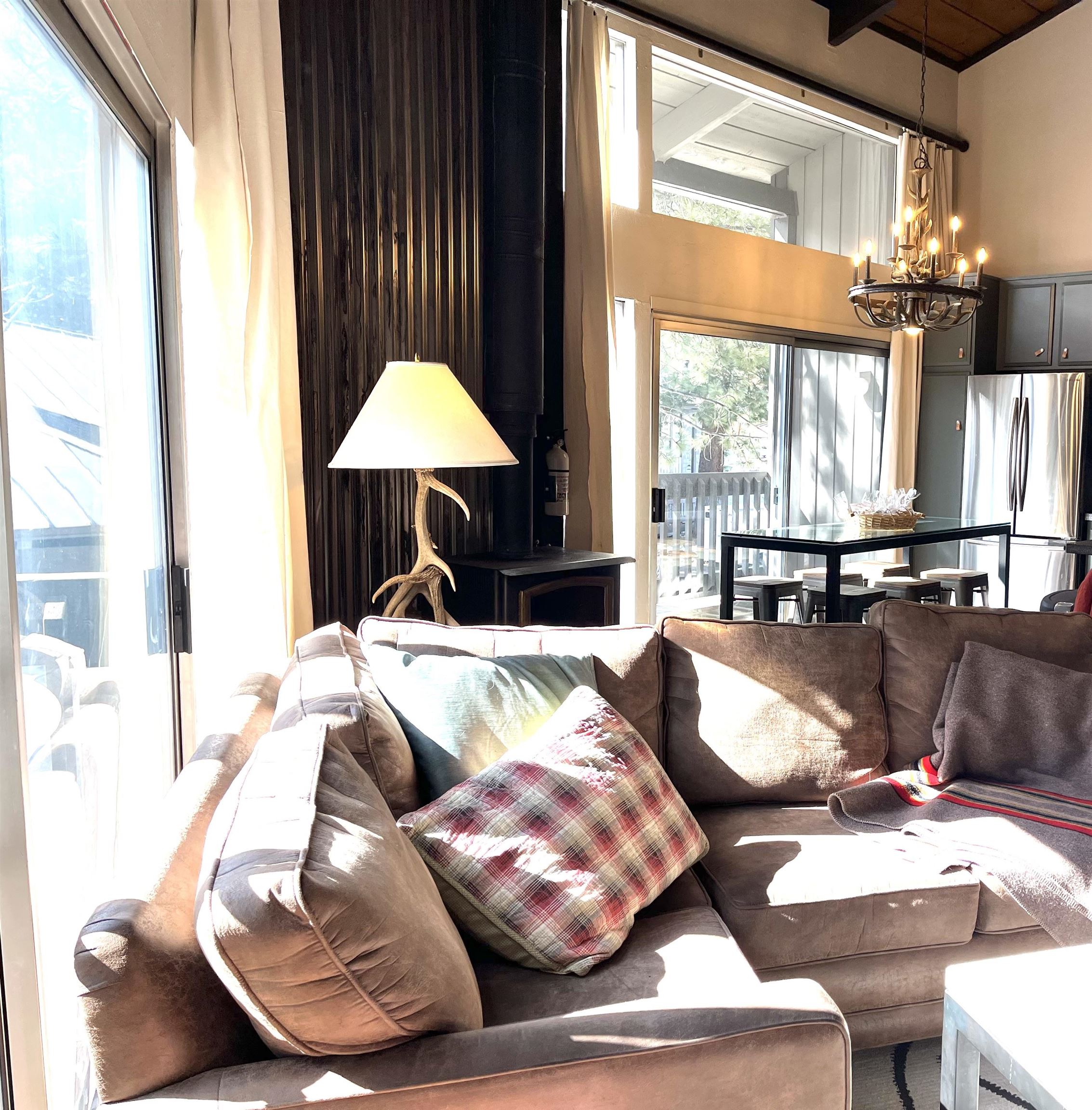 286 Old Mammoth Road, Unit 7 Mammoth Lakes, CA 93546 - Photo 6 of 31 a living room with furniture and a large window