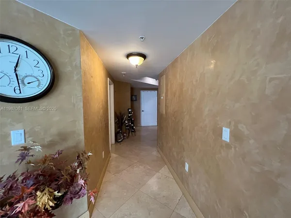 a view of a hallway with elevator