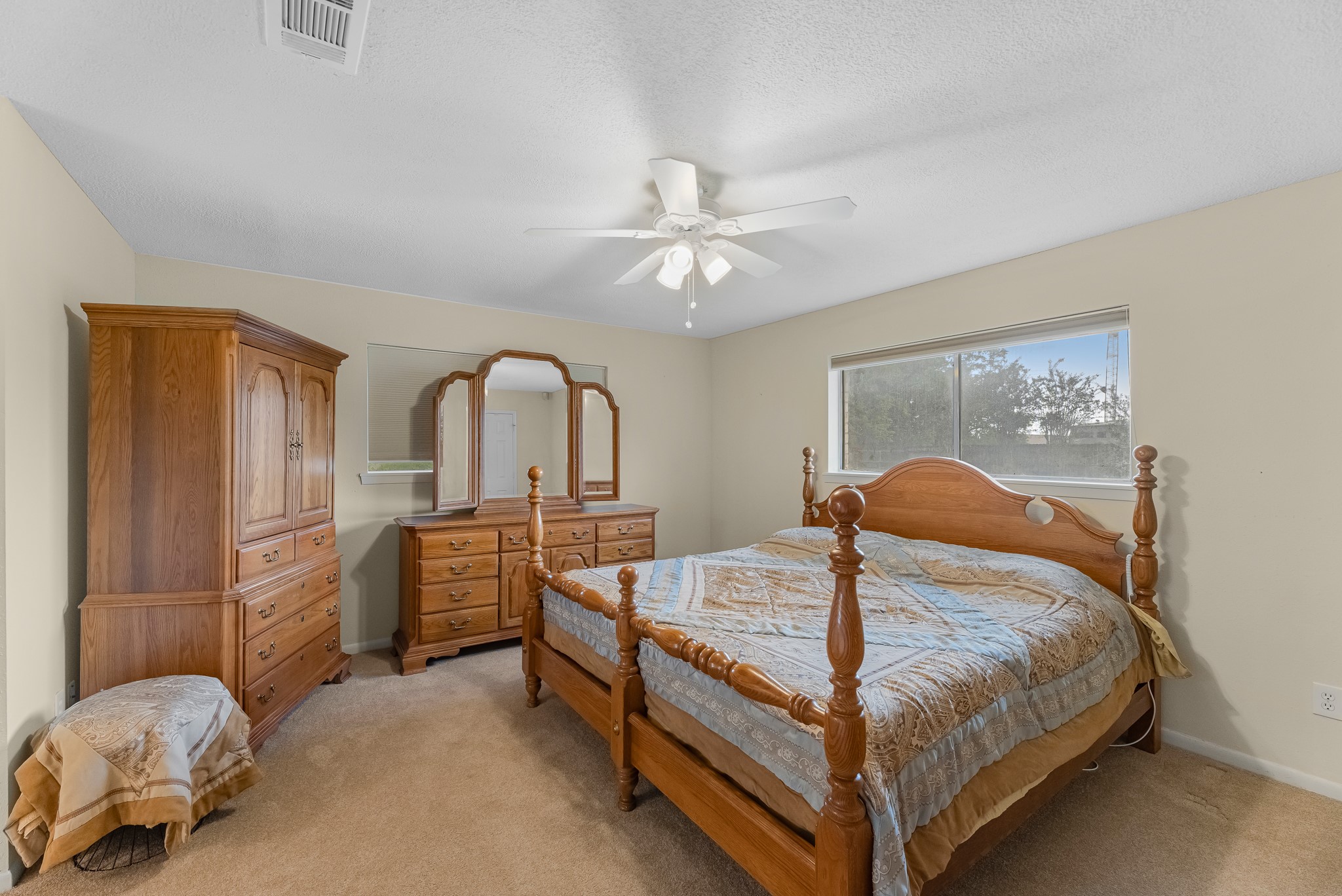 7315 Pine Street Manvel, TX 77578 - Photo 18 of 50 a bedroom with a bed and wooden floor
