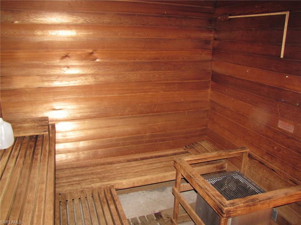 2005 Pine Isle Lane, Unit 2005 Naples, FL 34112 - Photo 22 of 23 Community sauna with wood walls.