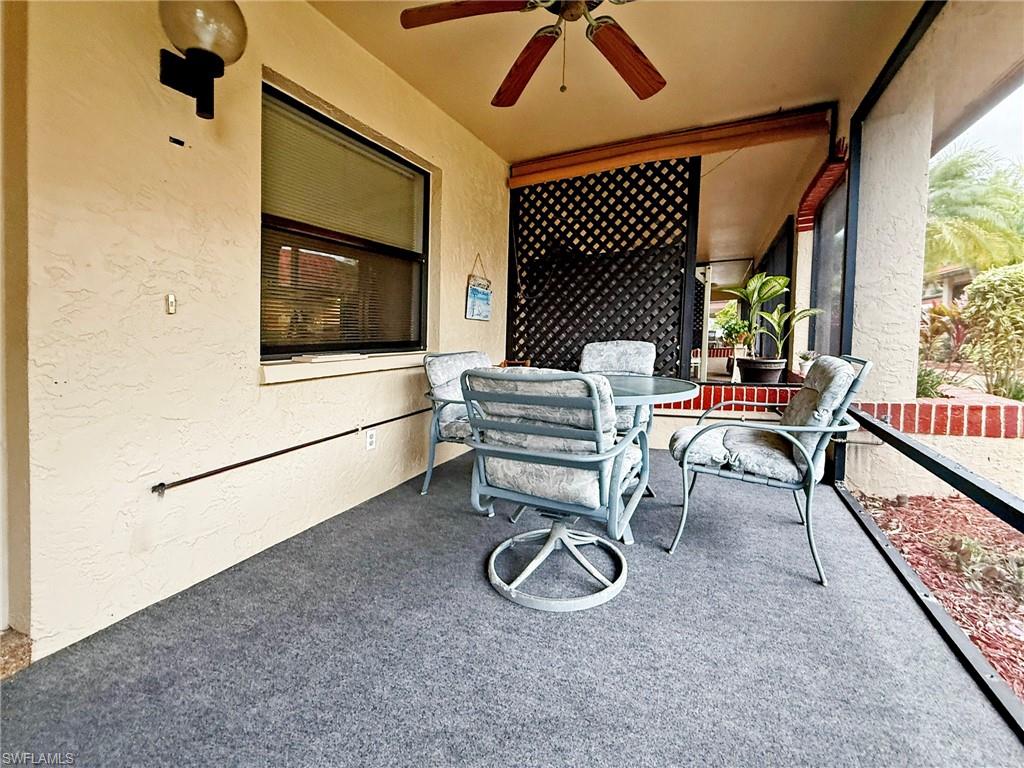 2005 Pine Isle Lane, Unit 2005 Naples, FL 34112 - Photo 3 of 23 Front screened verandah.