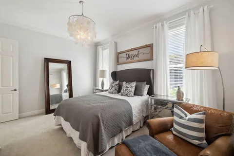 a bedroom with a bed and closet