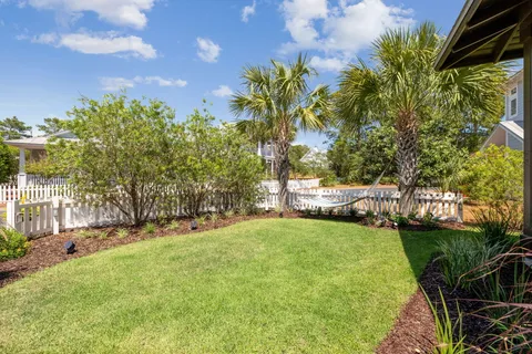 a view of a two chairs in the balcony