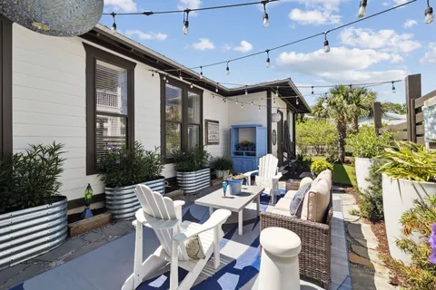 a view of house with backyard and garden