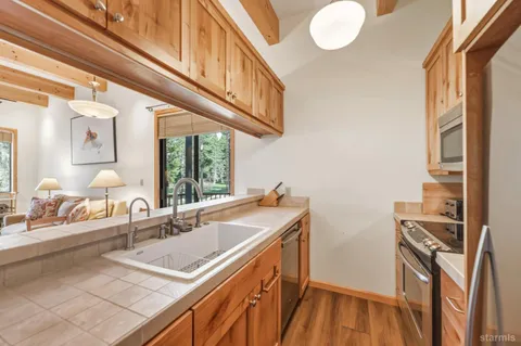 a bathroom with a sink and a window