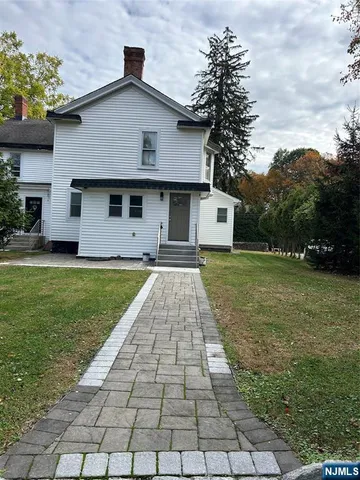 a front view of house with yard