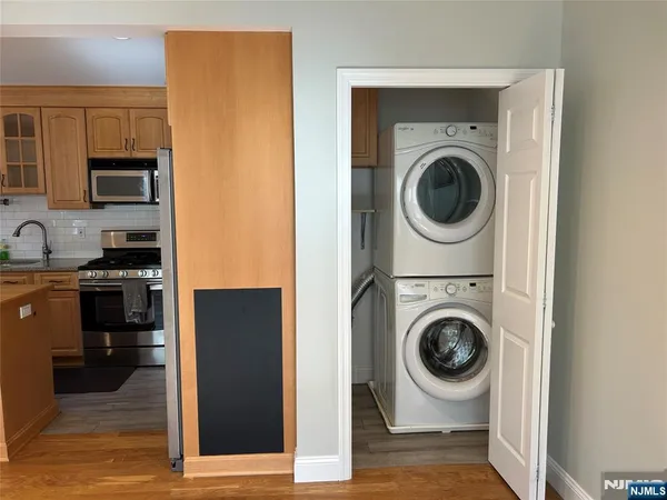 a view of a kitchen with washer and dryer