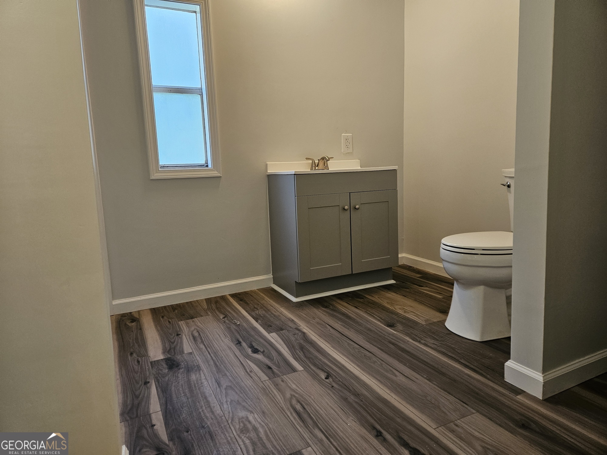 150 Back Street Metter, GA 30439 - Photo 13 of 21 a bathroom with a sink and a toilet