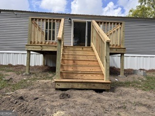 150 Back Street Metter, GA 30439 - Photo 19 of 21 a view of a house with backyard and deck
