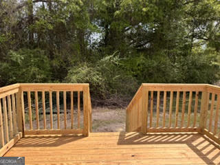 150 Back Street Metter, GA 30439 - Photo 21 of 21 a view of balcony with wooden floor