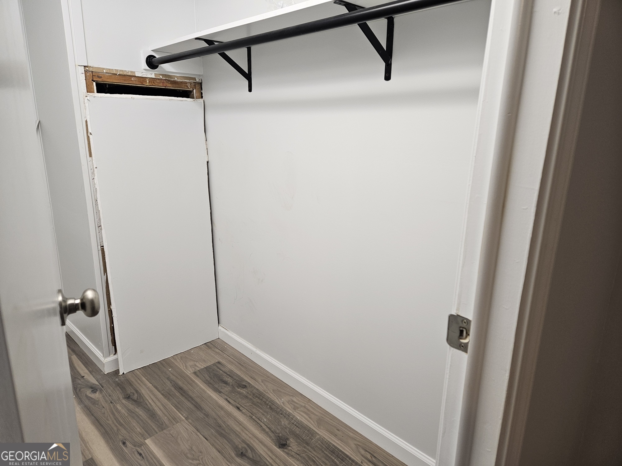 150 Back Street Metter, GA 30439 - Photo 8 of 21 a view of a room with rack on the wall