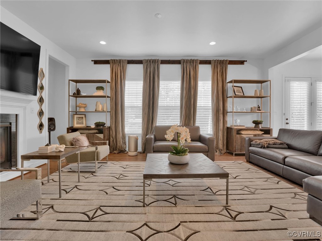 15324 Sultree Drive Midlothian, VA 23112 - Photo 18 of 48 a living room with furniture large window and a flat screen tv