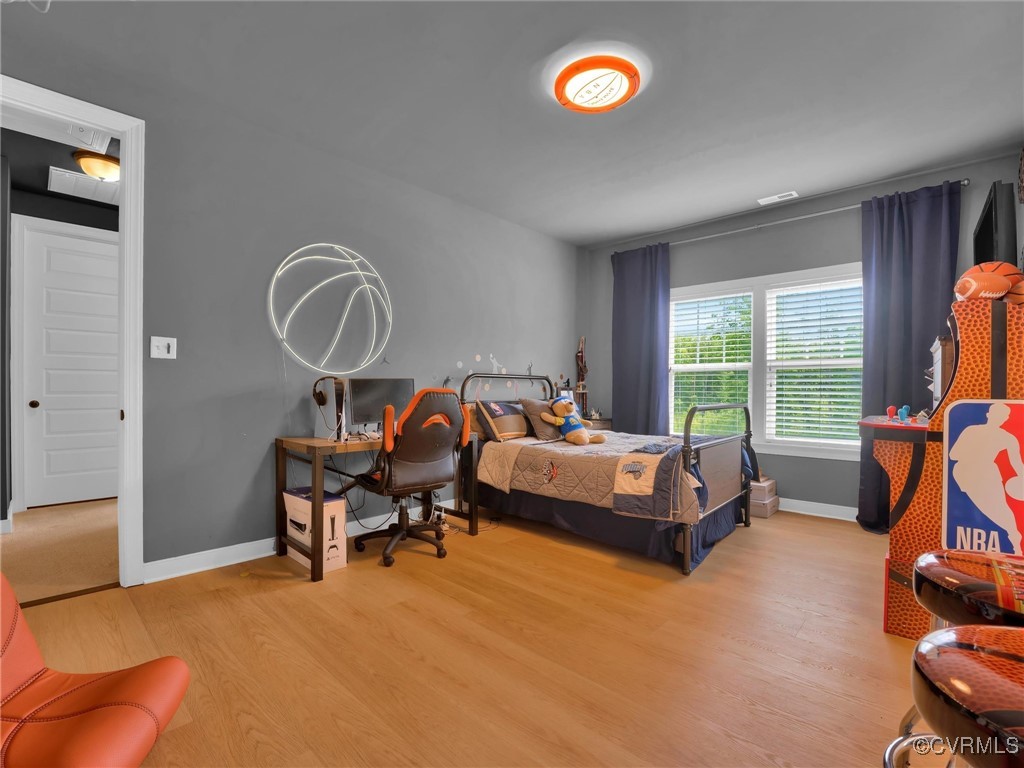 15324 Sultree Drive Midlothian, VA 23112 - Photo 35 of 48 a bedroom with furniture and a window