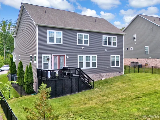 a front view of house with yard and outdoor seating