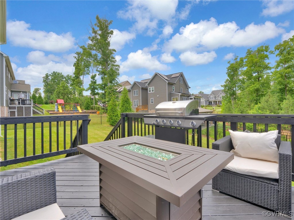 15324 Sultree Drive Midlothian, VA 23112 - Photo 44 of 48 a balcony with a table and chairs