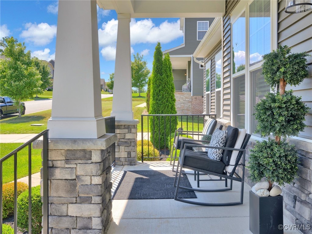 15324 Sultree Drive Midlothian, VA 23112 - Photo 5 of 48 a front view of a house with outdoor seating