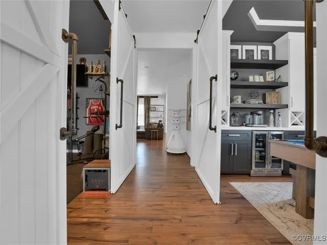 a view of a kitchen and an entryway