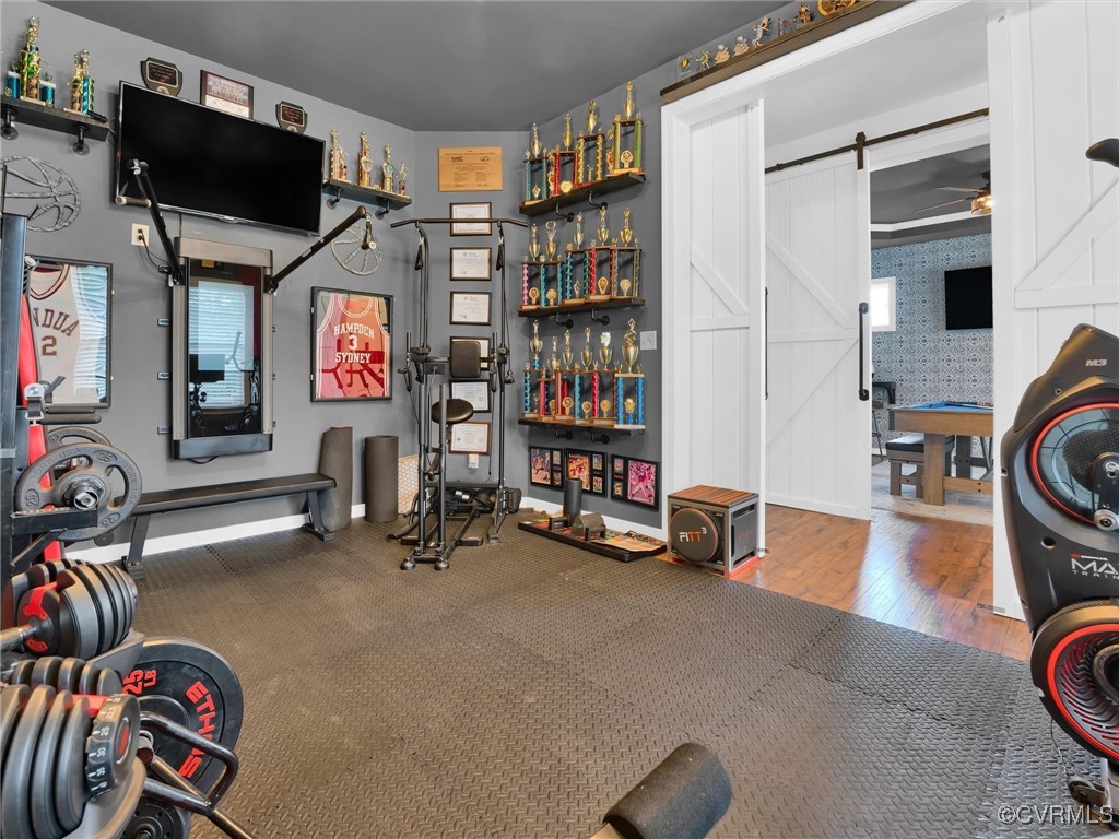15324 Sultree Drive Midlothian, VA 23112 - Photo 8 of 48 a view of a room with gym equipment